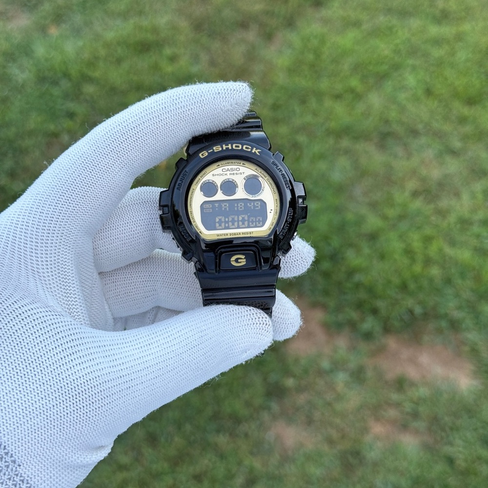 G-SHOCK Black and Gold Digital Watch men’s